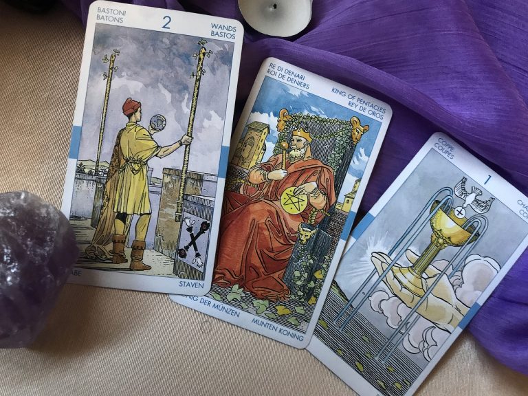 tarot cards on purple cloth